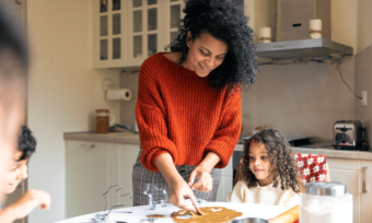 Mom in the kitchen with children